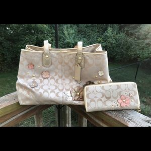 Coach purse with matching wallet.